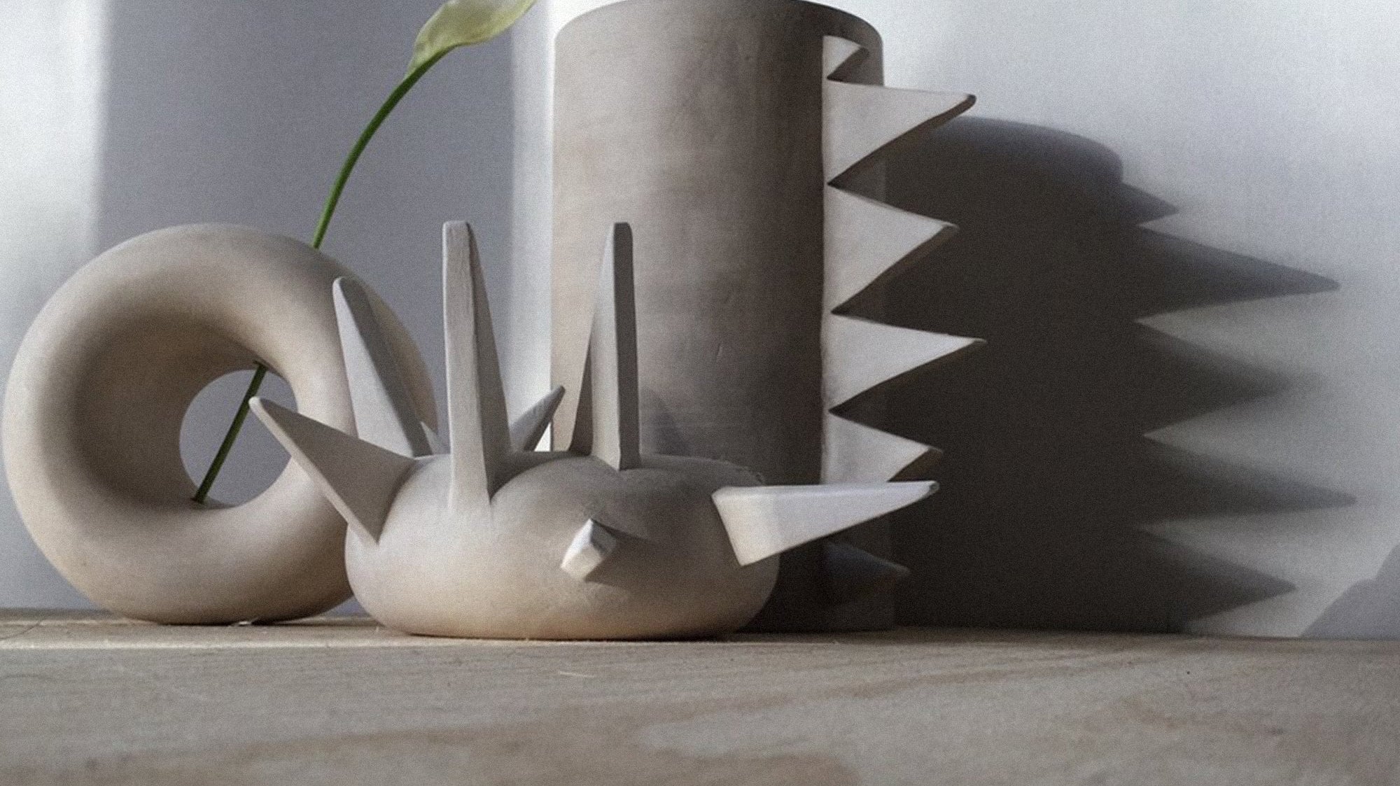 Series of ceramic sculptures on a table