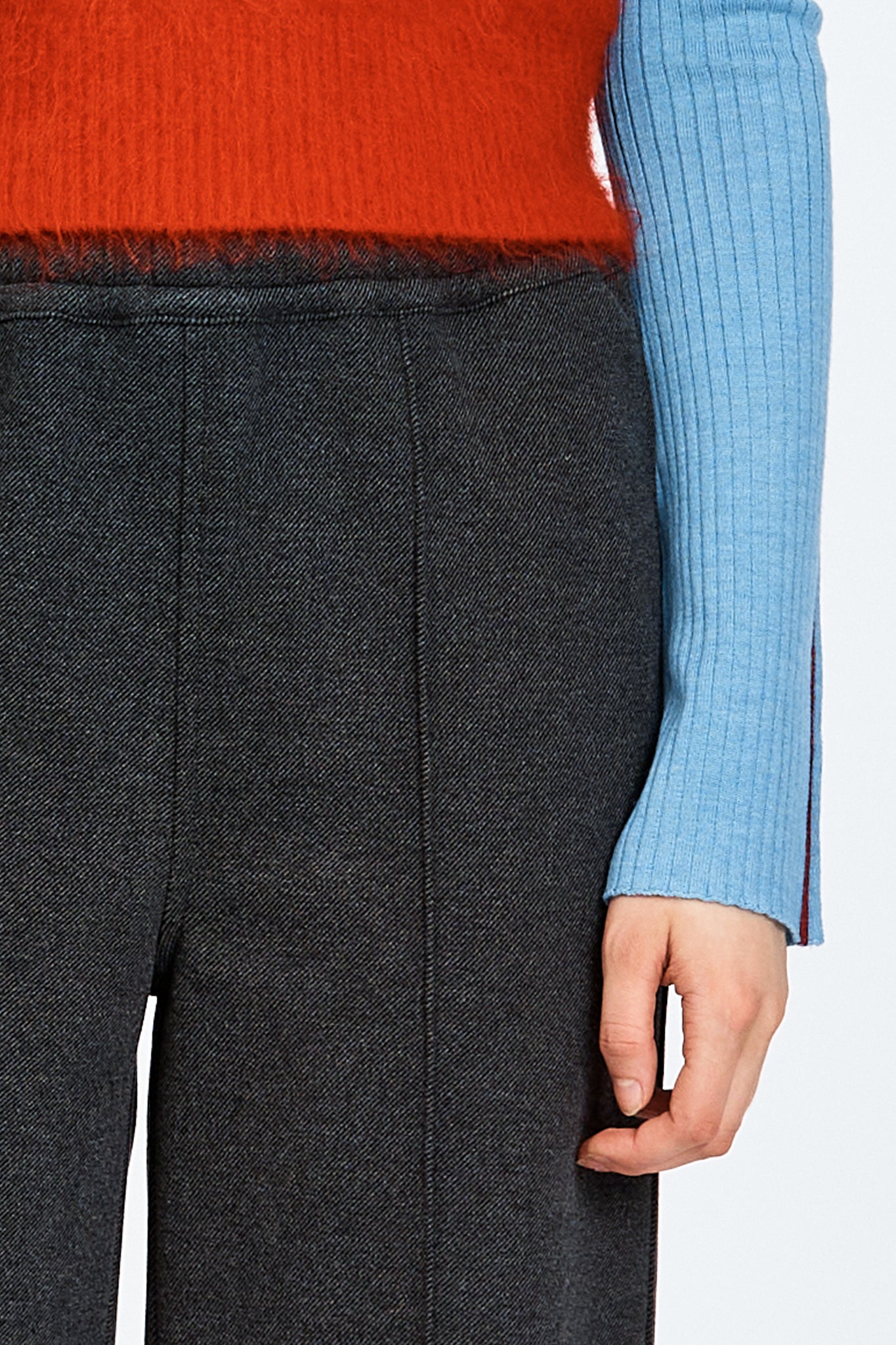 Model wearing relaxed silhouette charcoal pant