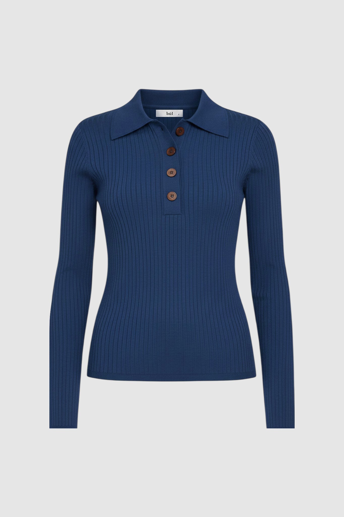 Woman wearing blue knitted long sleeve top
