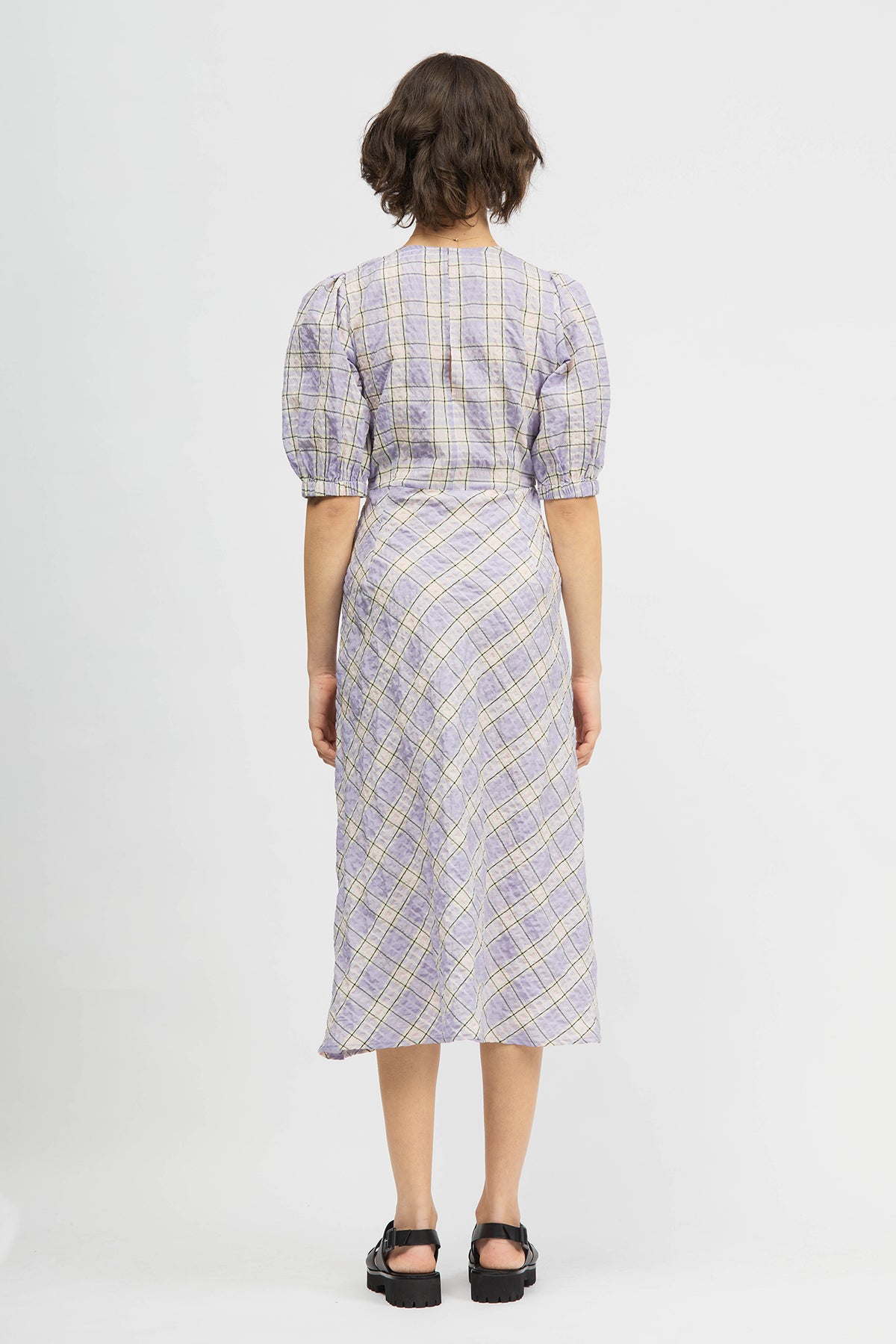 Woman wearing lilac dress