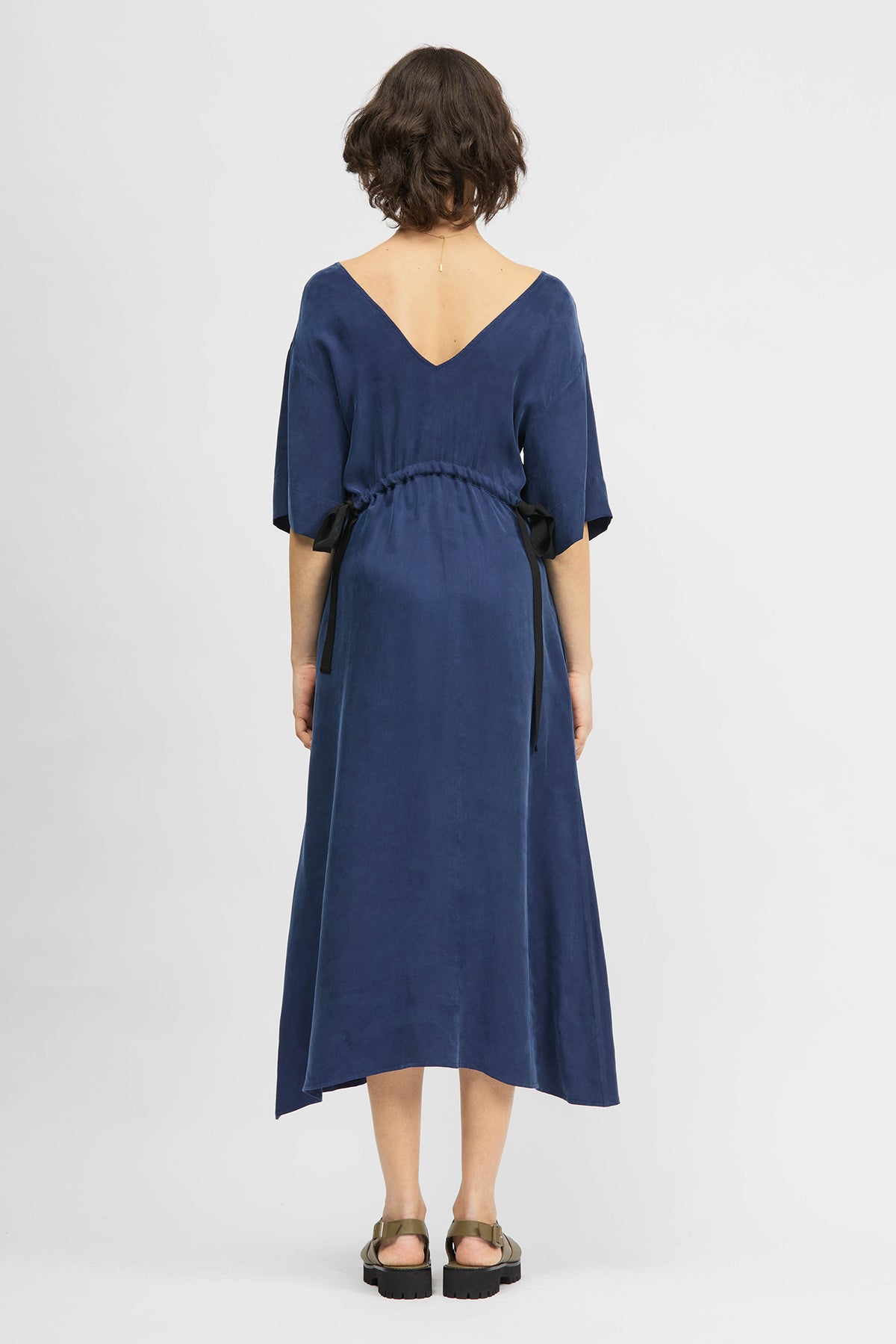 Woman wearing navy dress