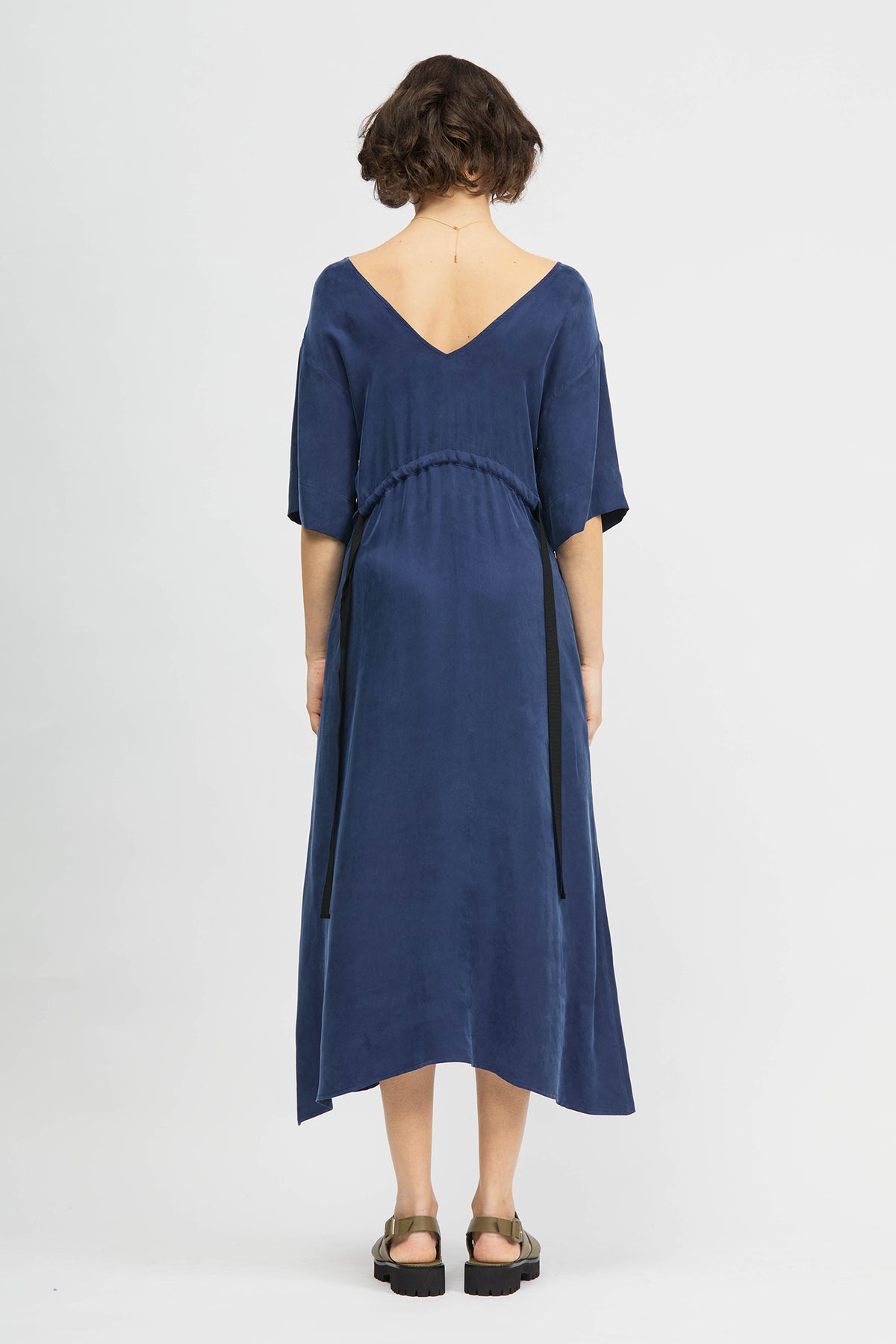 Woman wearing navy dress