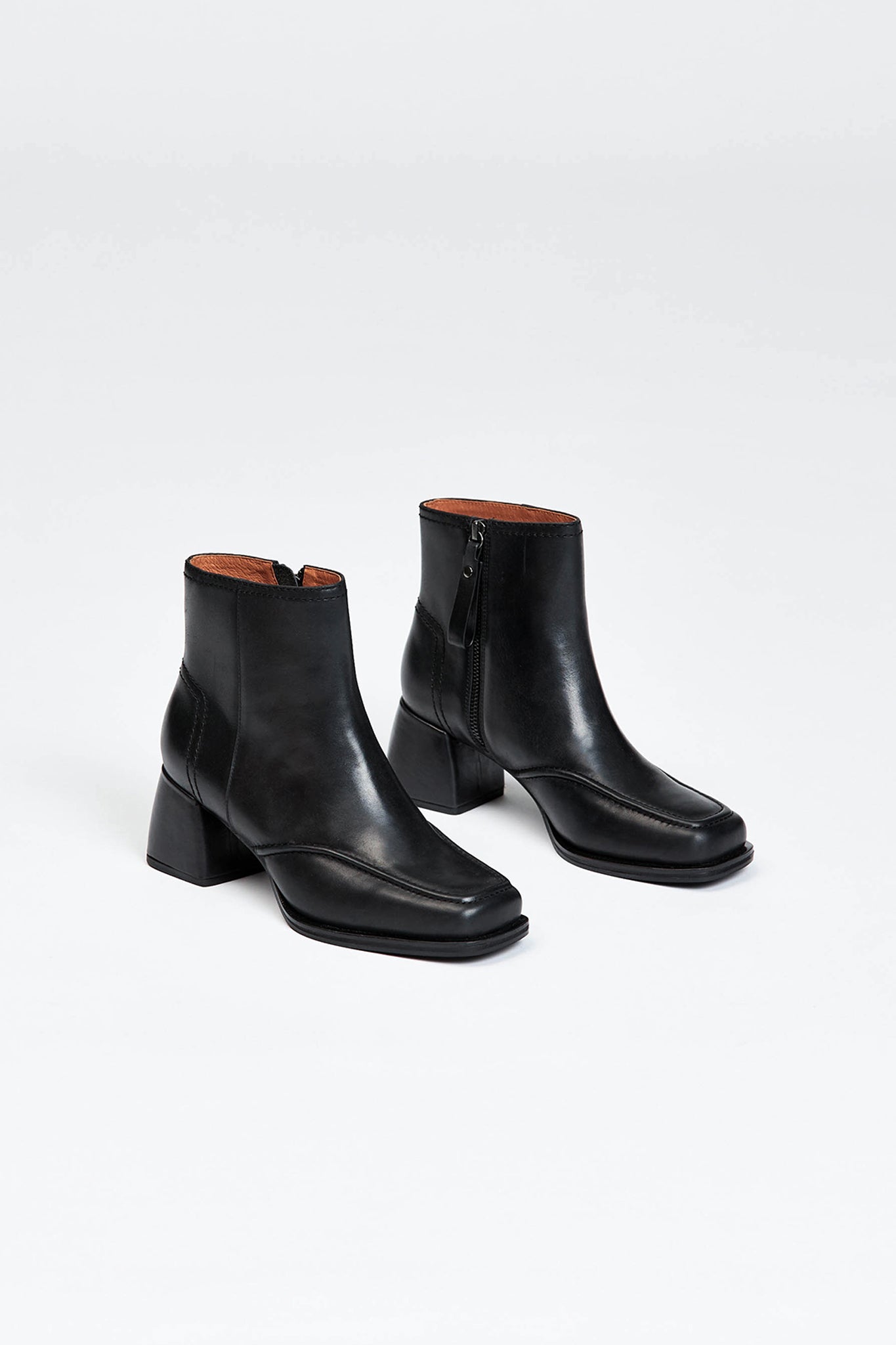 Black leather ankle boot with a block heel