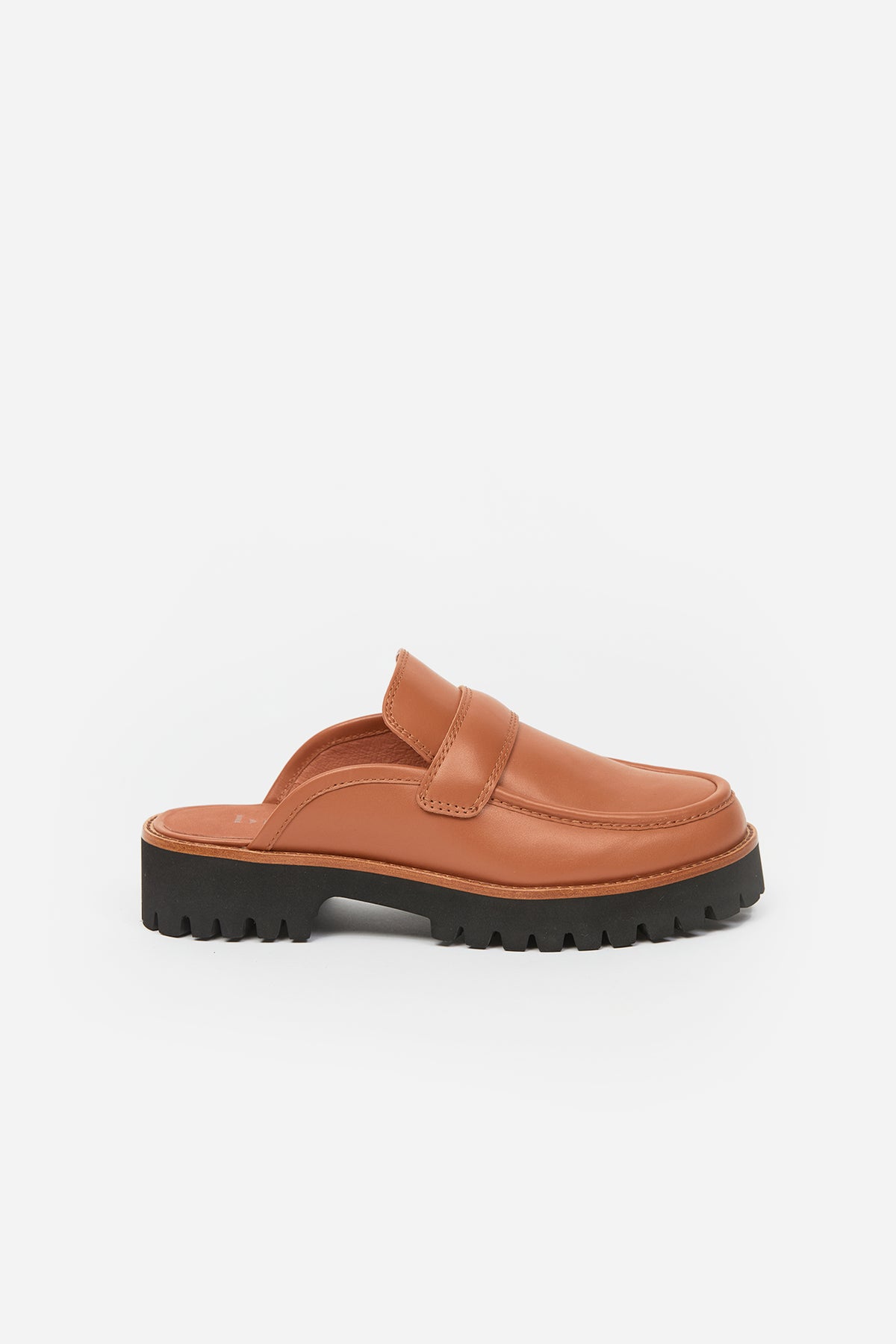 Brown womans loafer with black sole