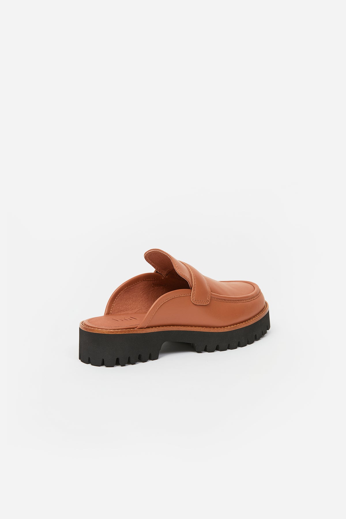 Brown womans loafer with black sole