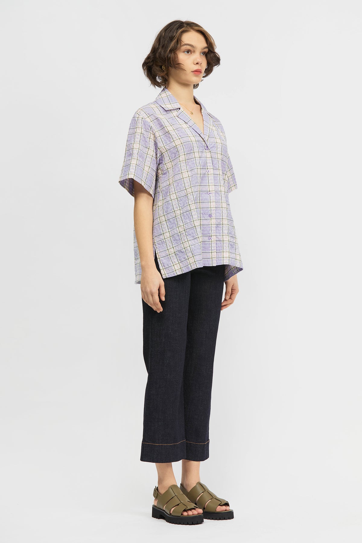 Woman wearing shirt in lilac check