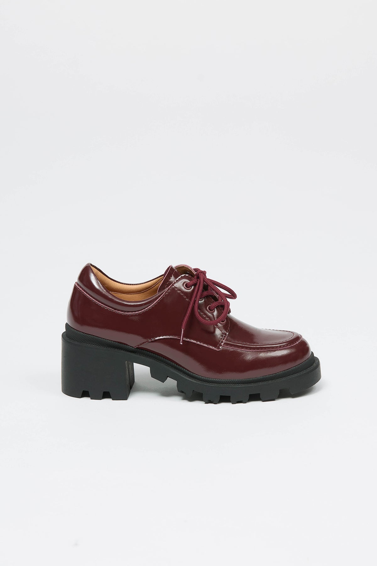 Image of a burgundy brogue shoe