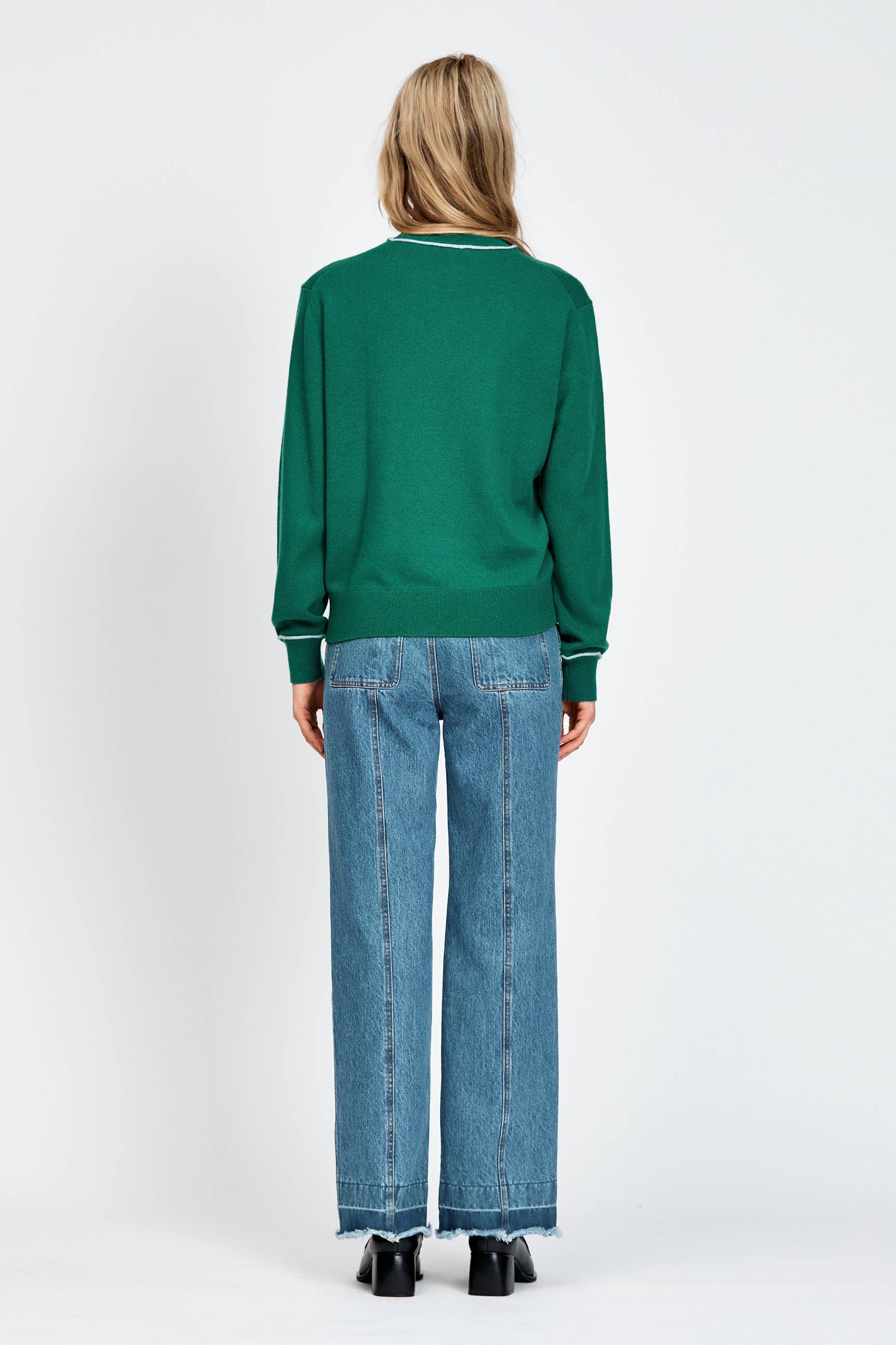 Women wearing green knitted jumper
