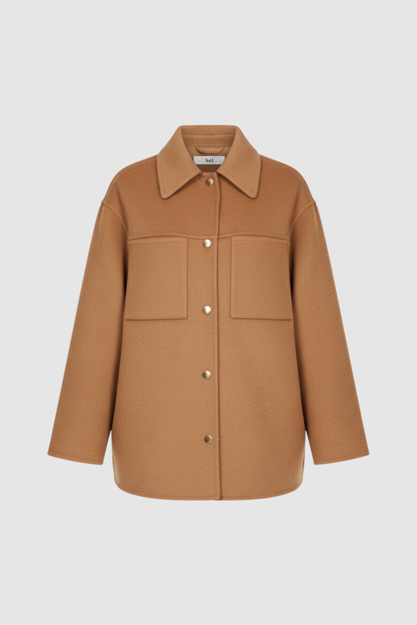 Model wearing a camel coat