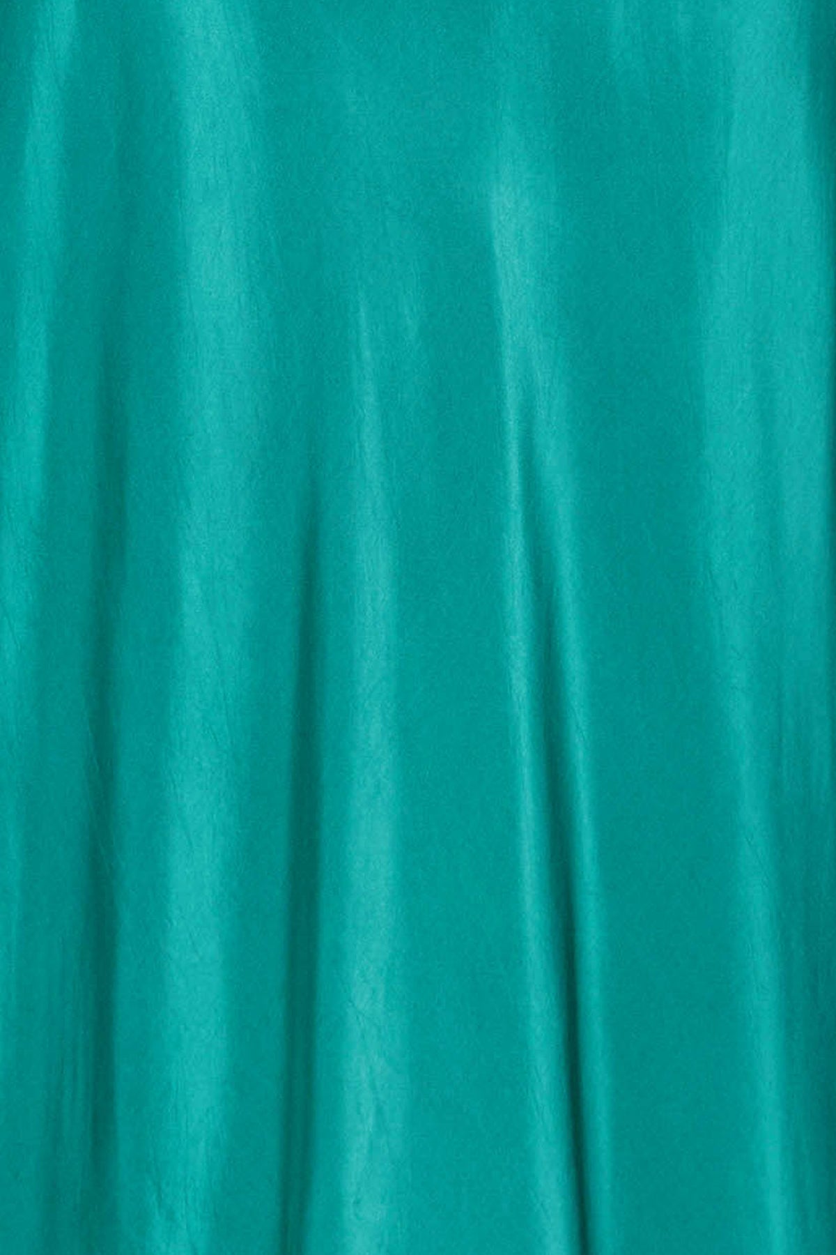Fabric swatch of the green viscose fabric