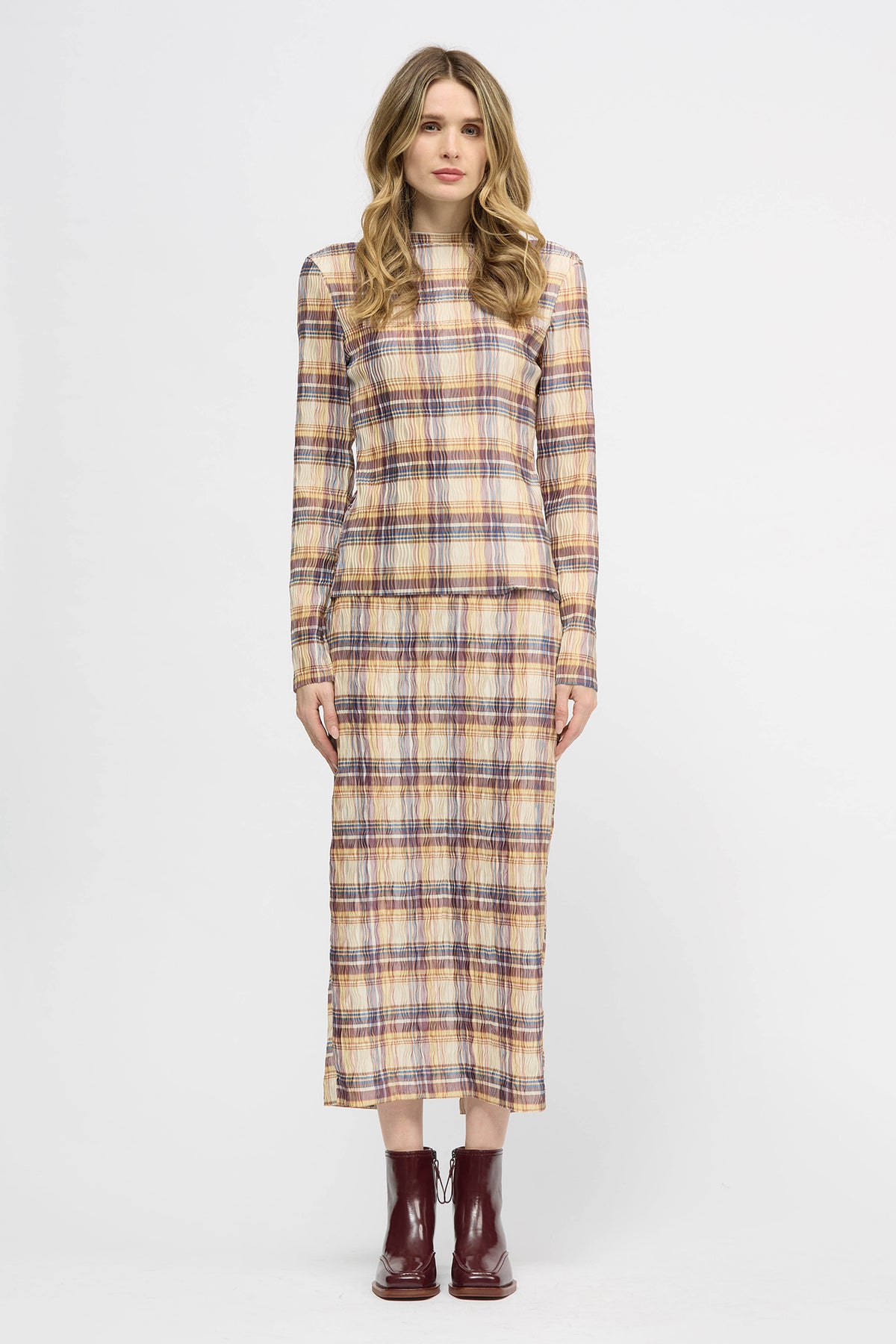 Woman wearing a yellow check lightweight long sleeve top