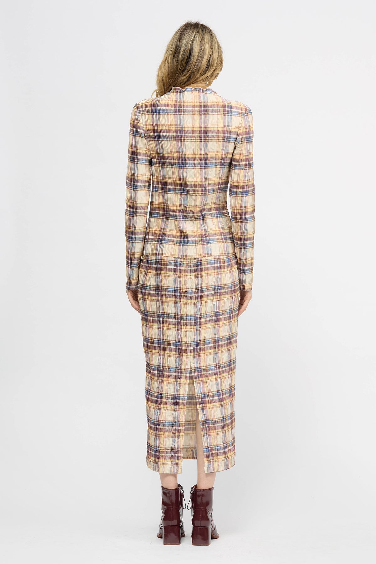Woman wearing a yellow check lightweight long sleeve top