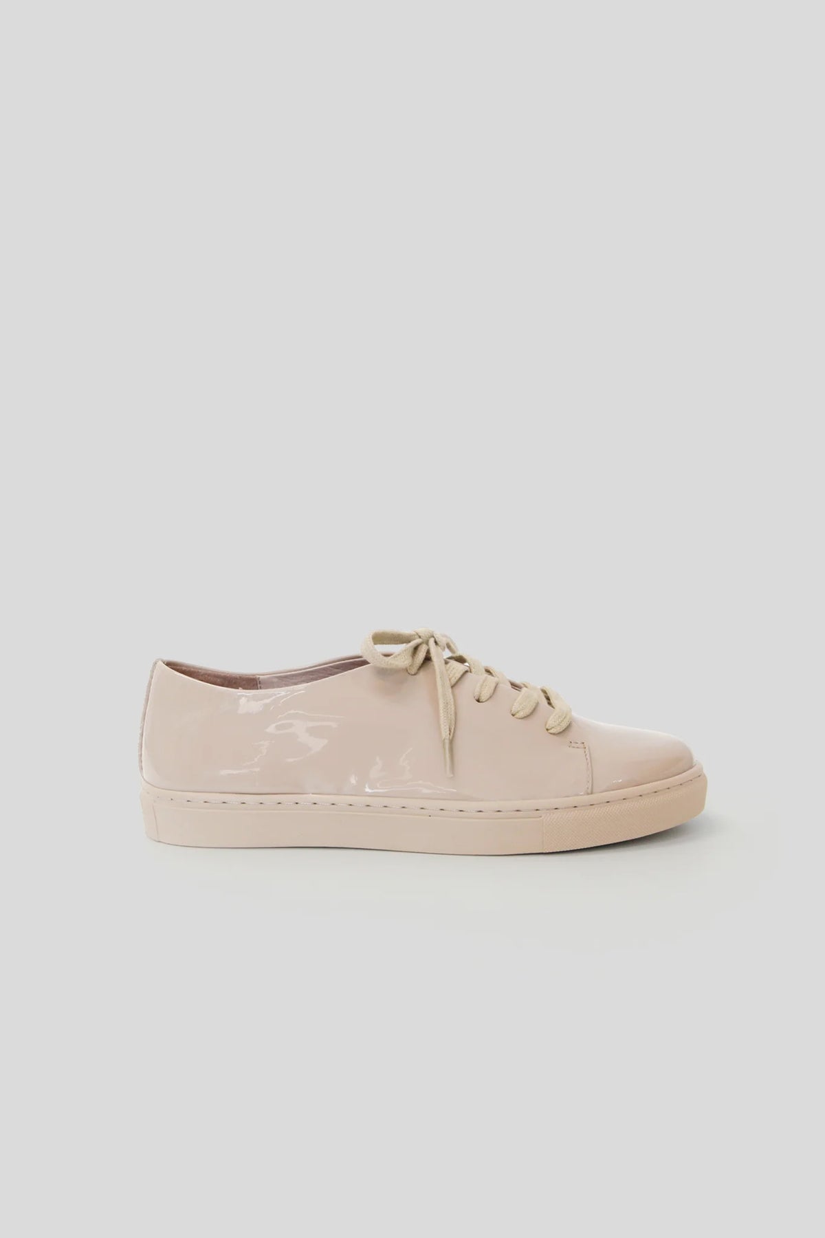 Image of womens sneaker in taupe colour