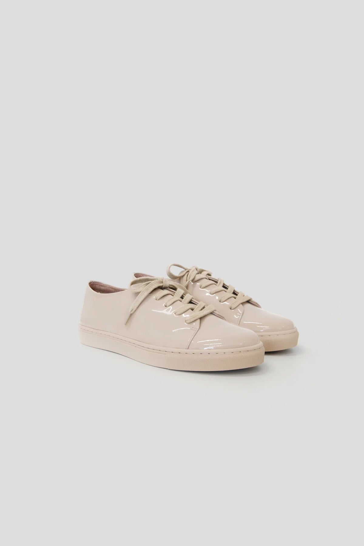 Image of womens sneaker in taupe colour