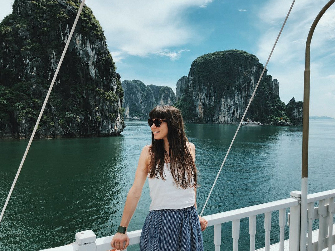 Person on a bridge overlooking the ocean in Hue, Vietnam