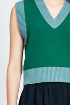 Woman wearing green vest