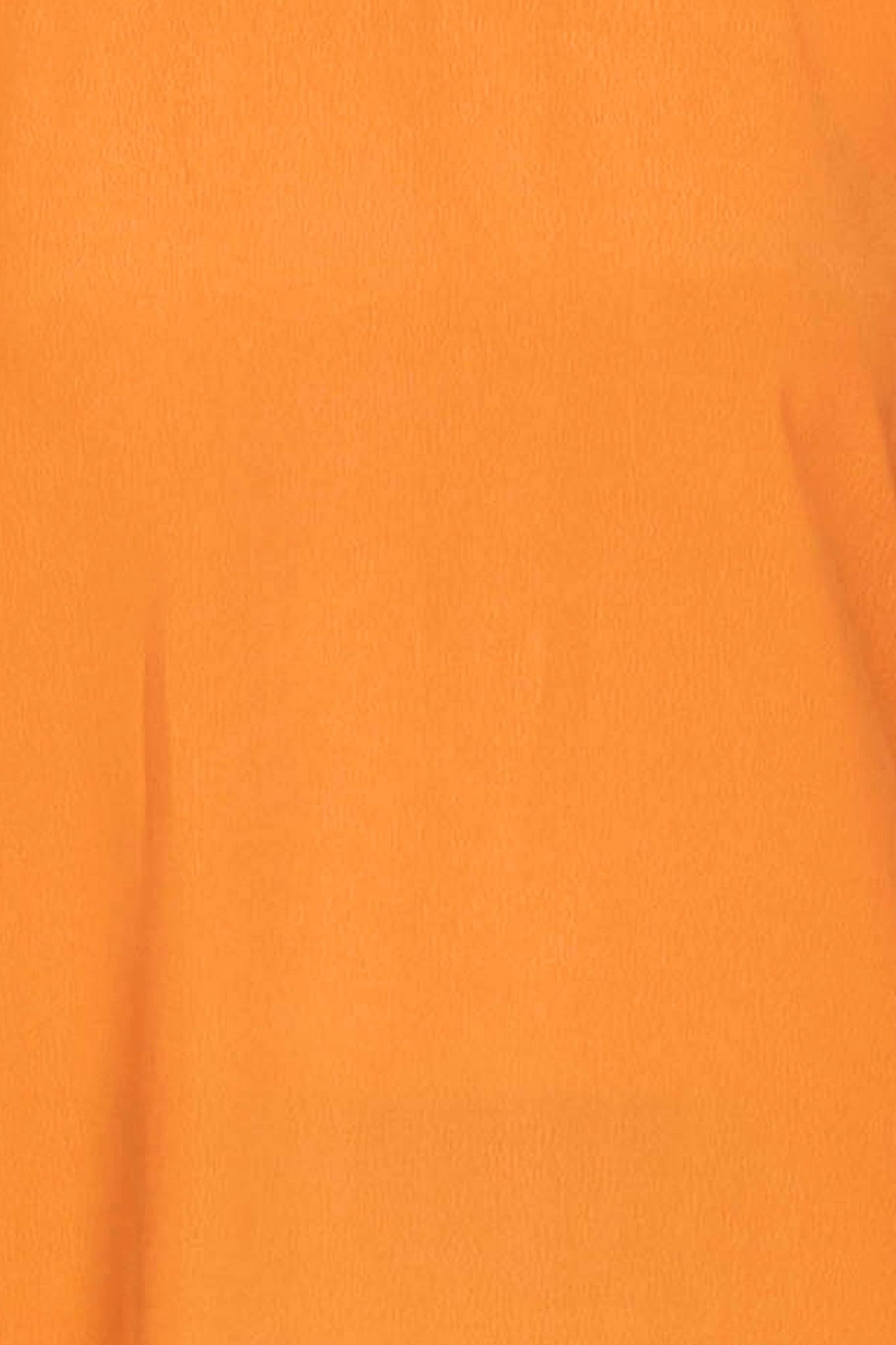 Fabric swatch of the orange top