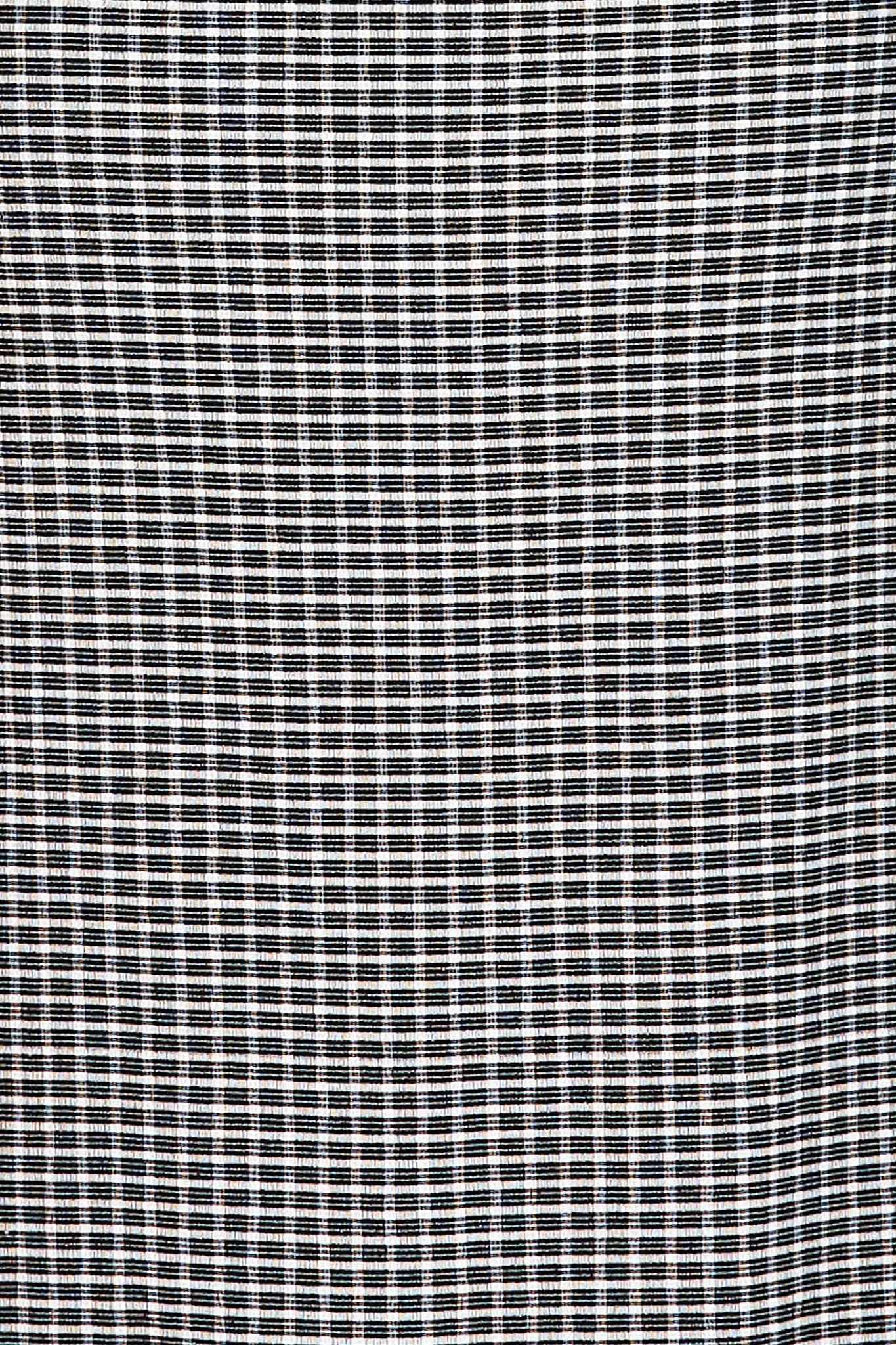 Fabric swatch of black and white material of the dress