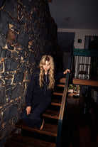 Model wearing relaxed silhouette charcoal pant