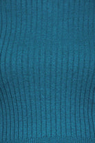 Fabric swatch of a teal ribbed knit mock neck top
