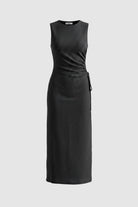 Image of the black and navy check dress with waist tie detailing
