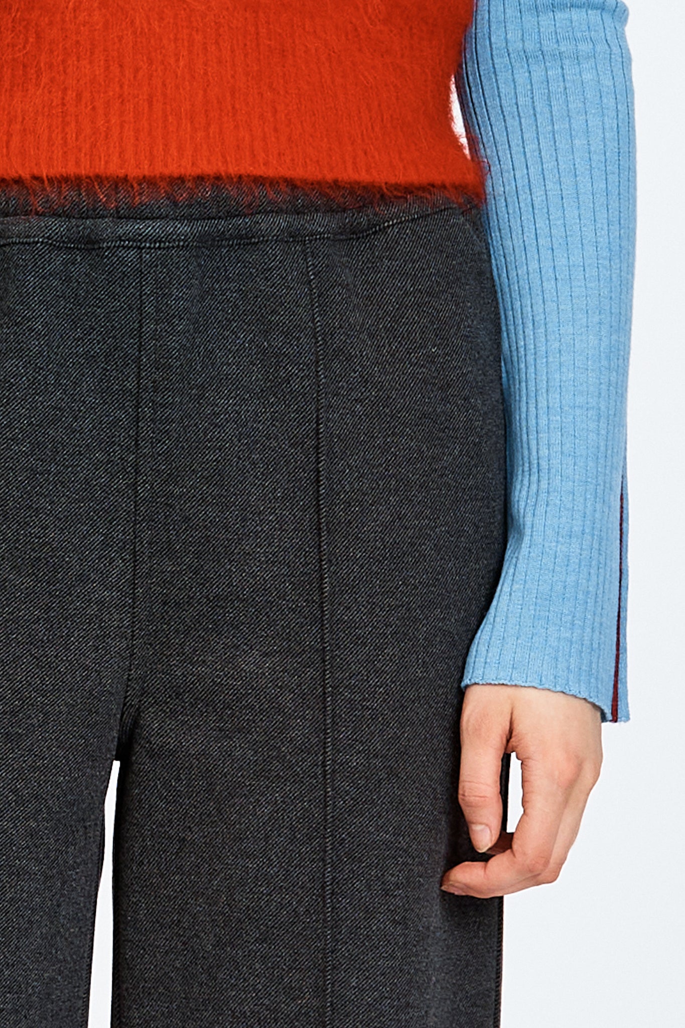 Model wearing relaxed silhouette charcoal pant