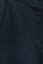 Model wearing navy pant