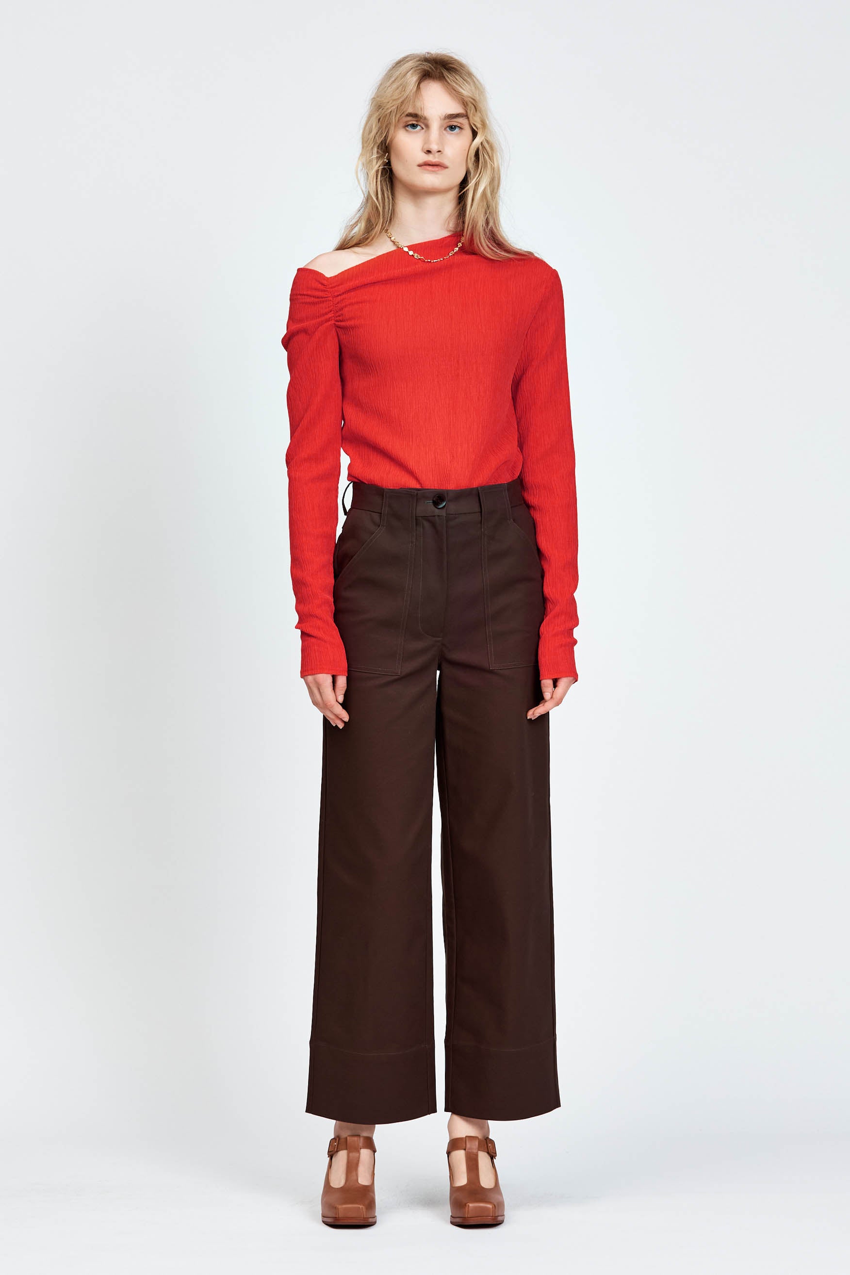 Woman wearing brown pants