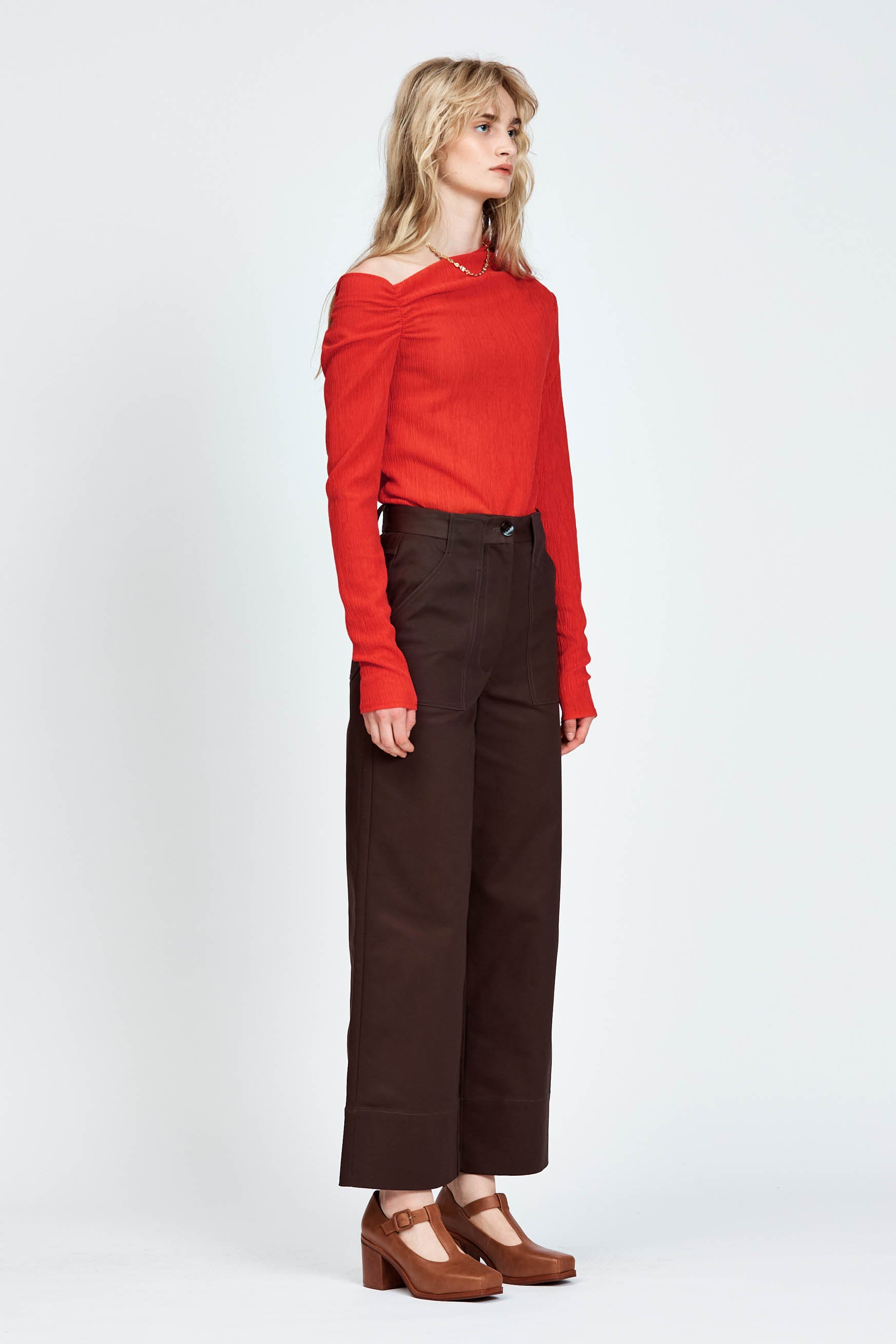 Woman wearing brown pants