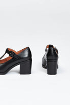 Black block heel shoe with buckle enclosure