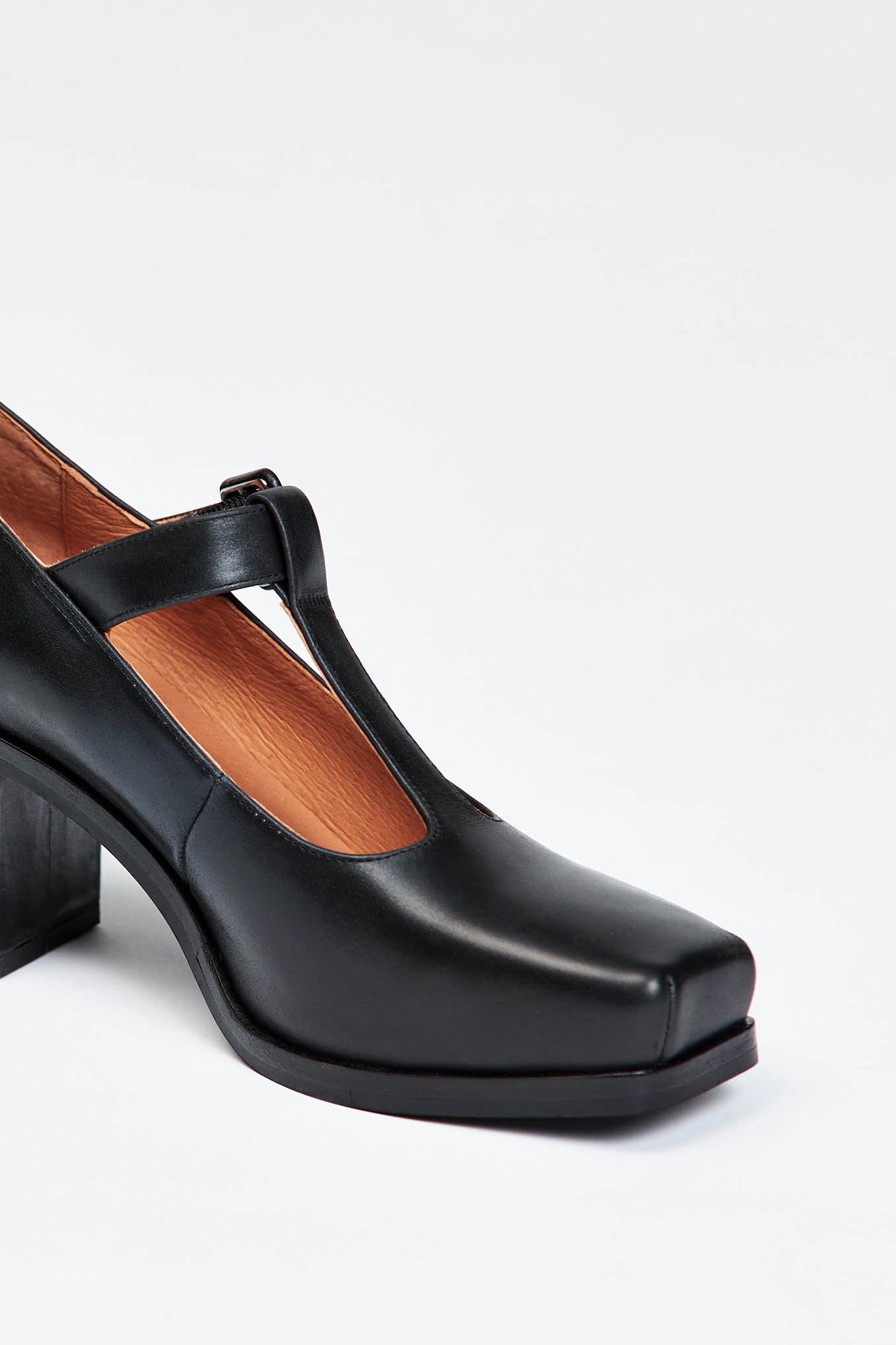 Black block heel shoe with buckle enclosure