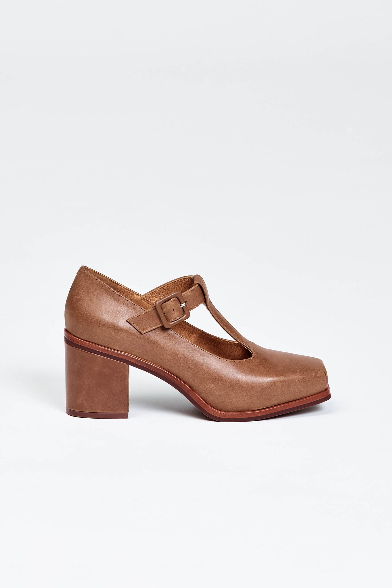 Brown block heel with buckle enclosure