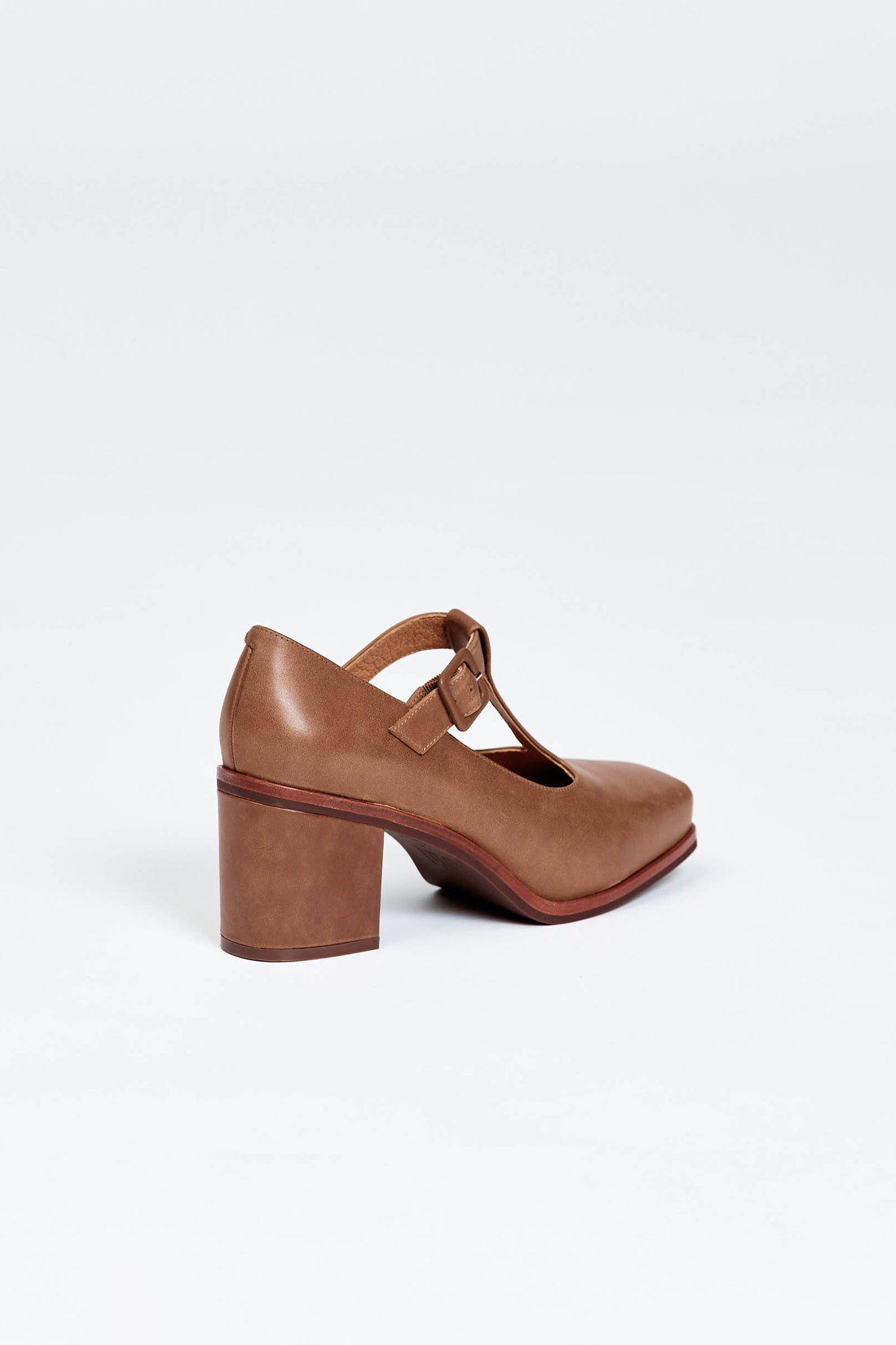 Brown block heel with buckle enclosure