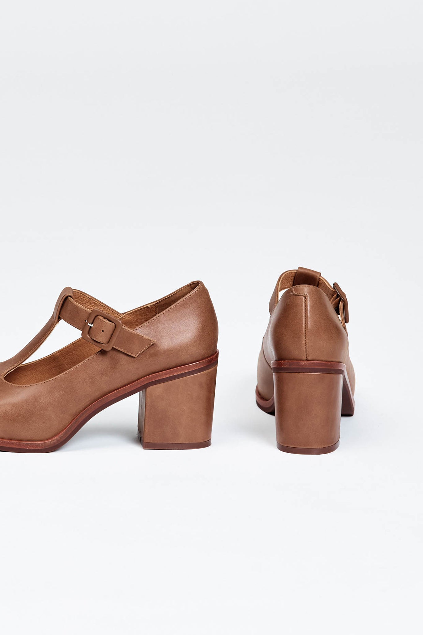 Brown block heel with buckle enclosure