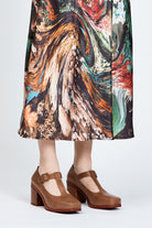 Brown block heel with buckle enclosure