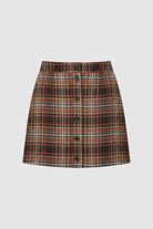 Woman wearing brown check mini skirt