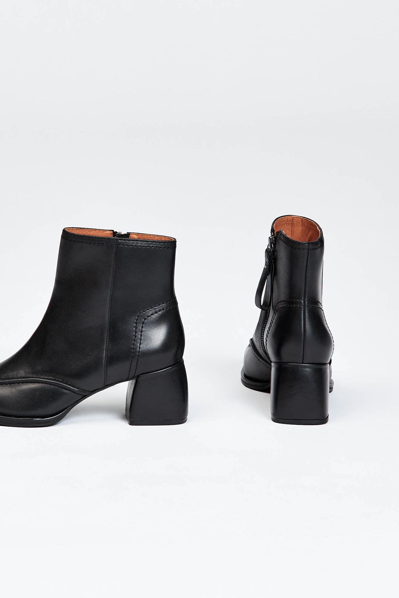 Black leather ankle boot with a block heel