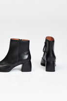 Black leather ankle boot with a block heel