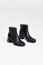 Black leather ankle boot with a block heel