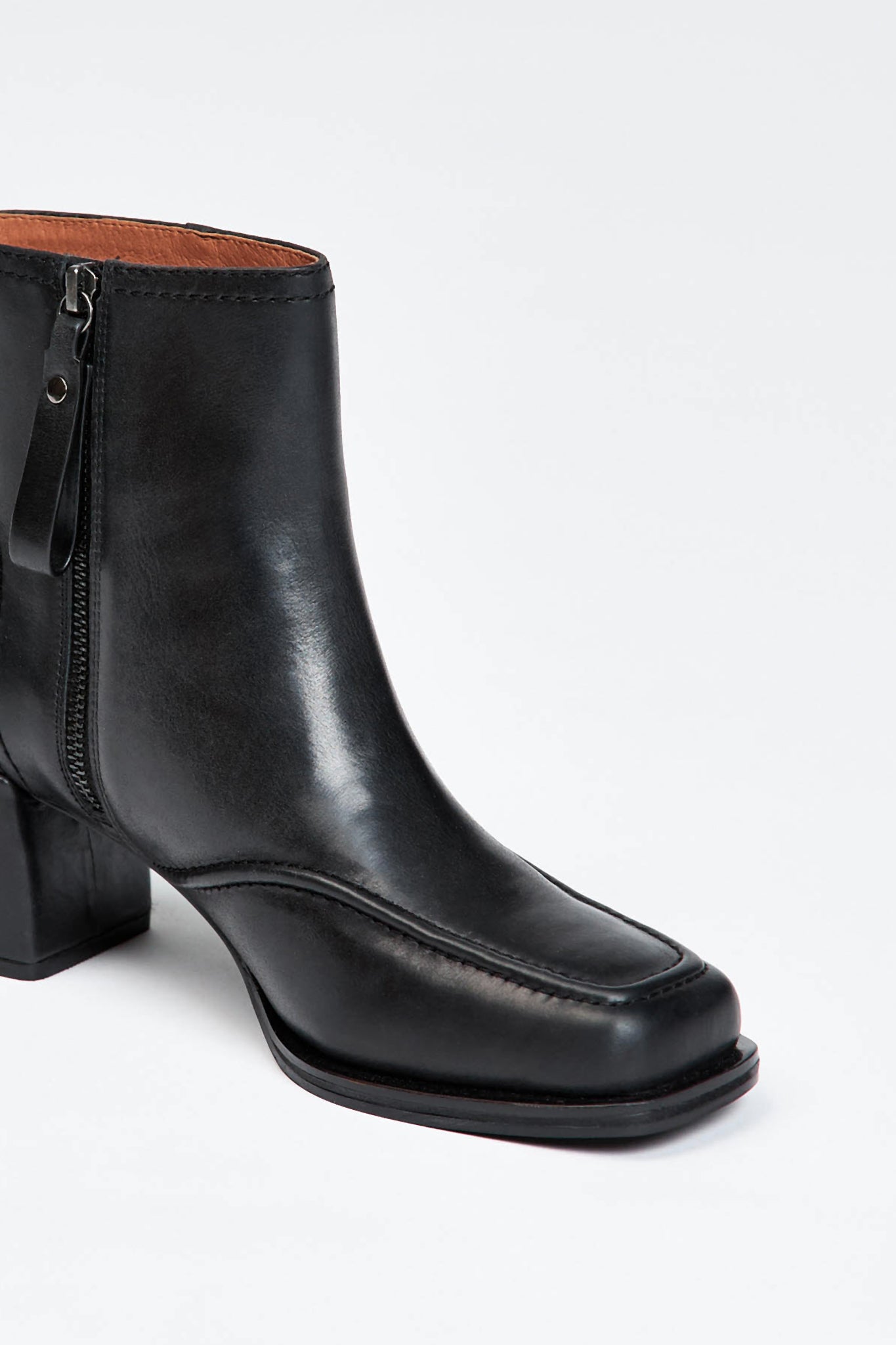 Black leather ankle boot with a block heel