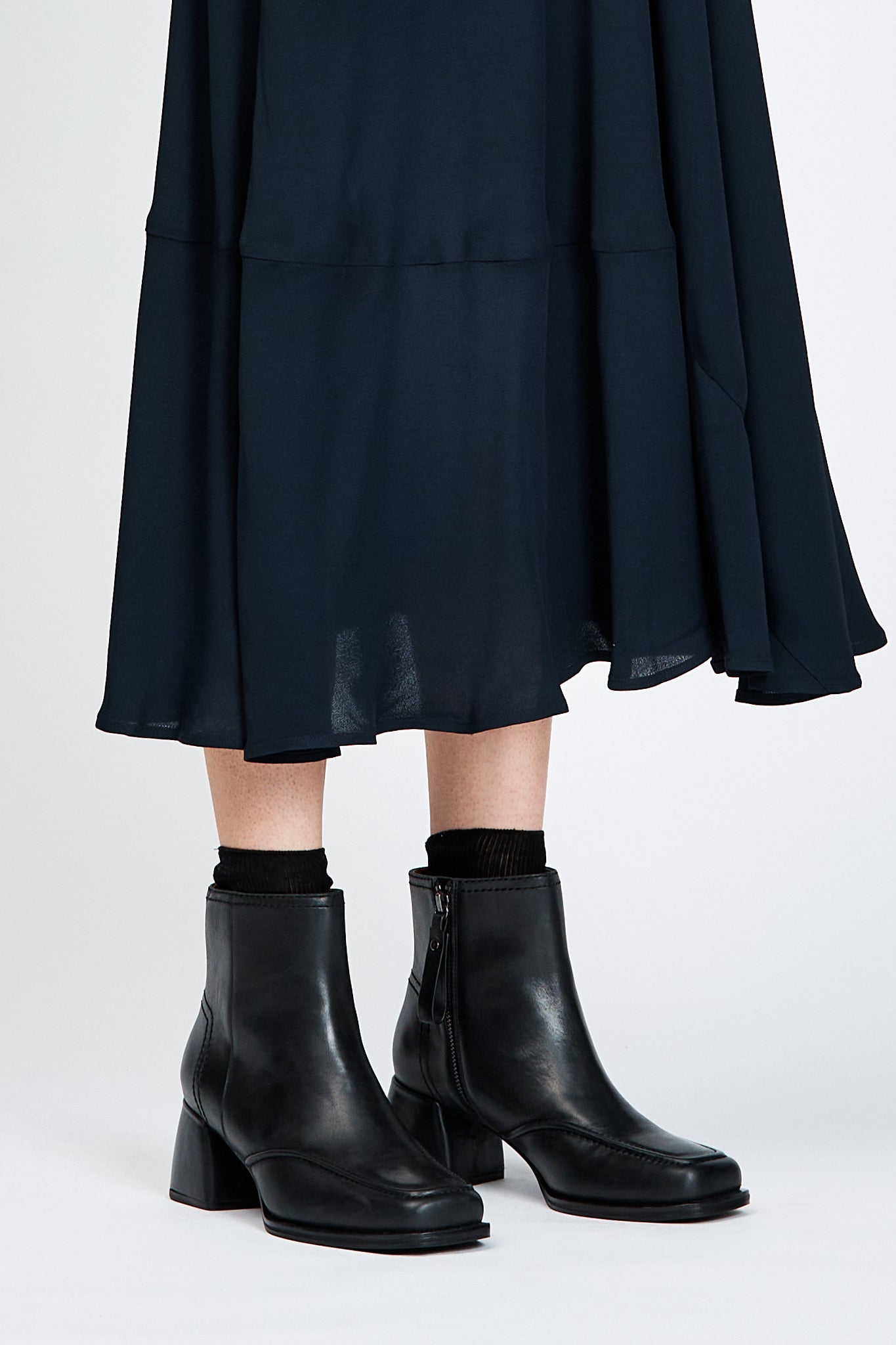 Black leather ankle boot with a block heel