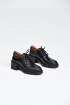 Black lace up shoe with heel
