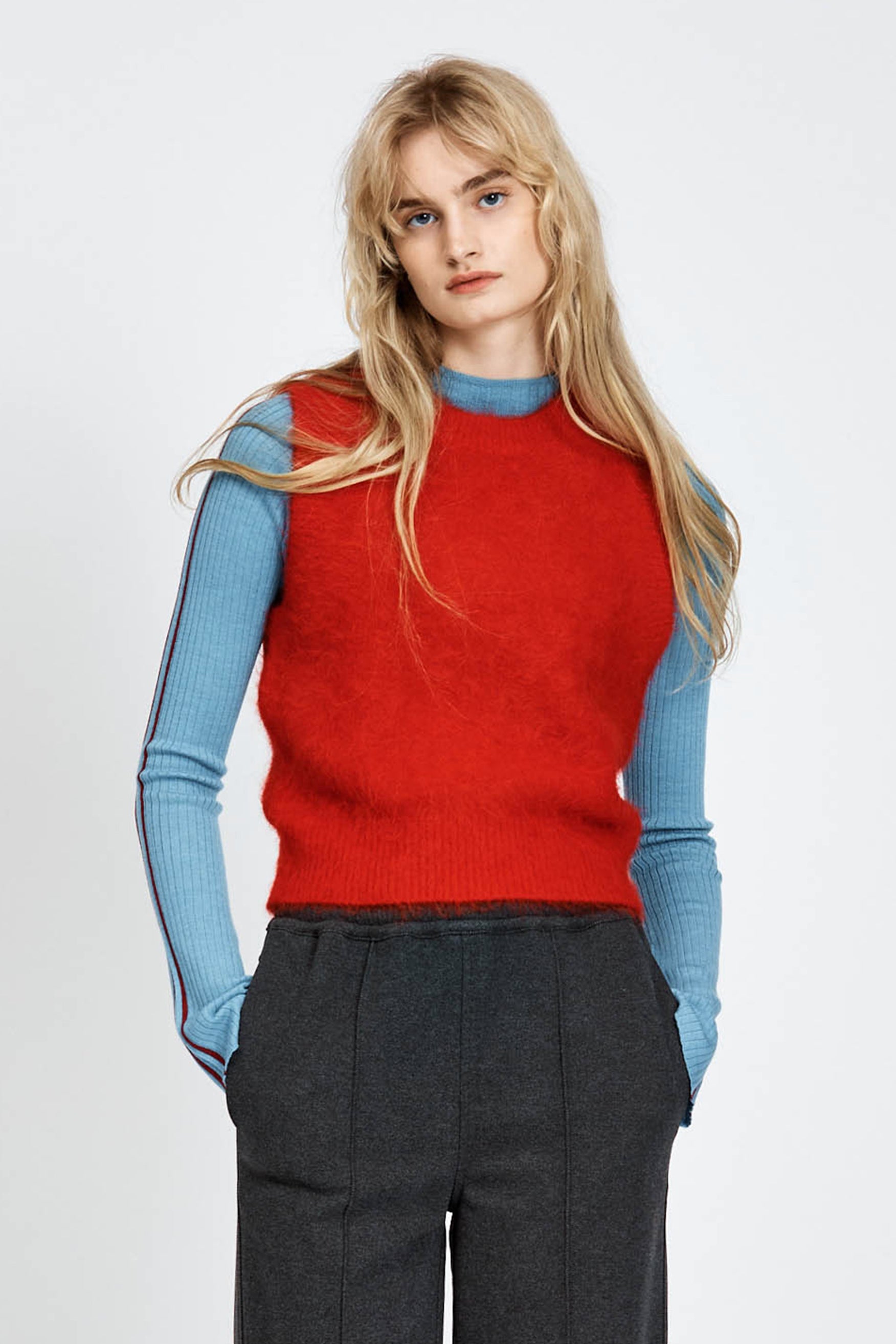 Woman wearing woollen red vest