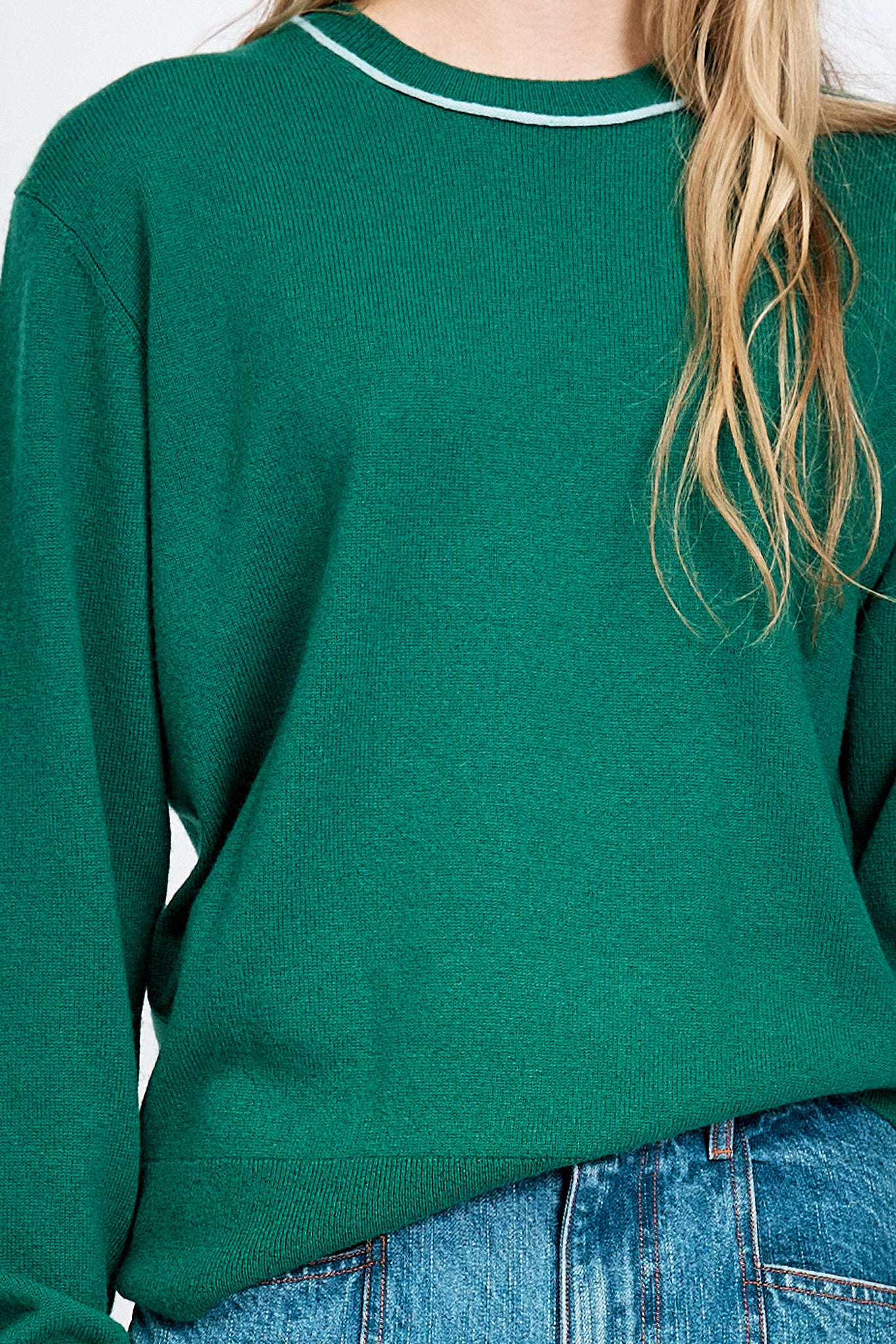 Women wearing green knitted jumper
