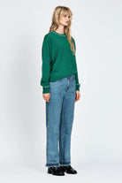 Women wearing green knitted jumper